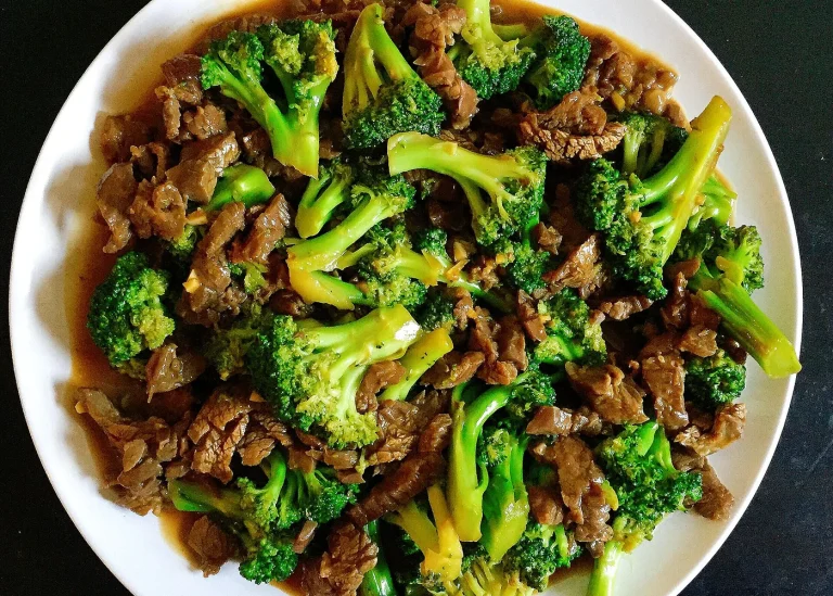 Beef and broccoli stir-fry served with rice.